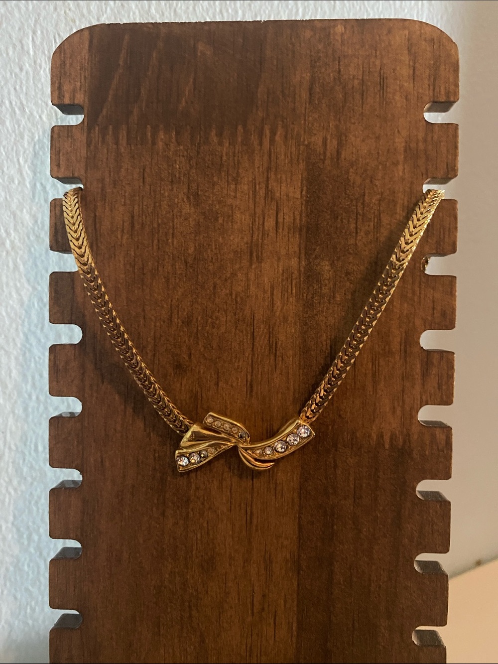 Gold Bow Ribbon Pendant Necklace with Crystal Accents